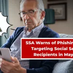 Concerned senior reading a suspicious email on a mobile with a warning symbol on screen